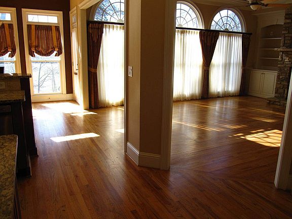 Kitchen Opens Up to Fireside Family Room!