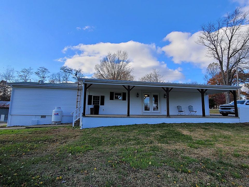 Huge front porch facing highway