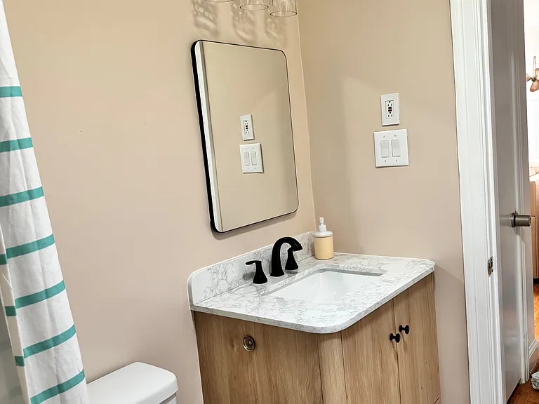 Full bathroom with brand new vanity sink, medical cabinet mirror and lighting in 2025!