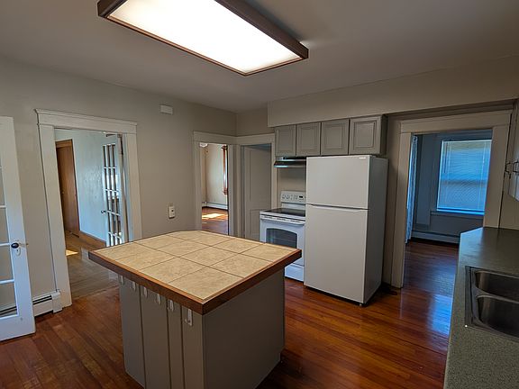 Kitchen view from porch entrance, view office, living room, dinning room, bath room