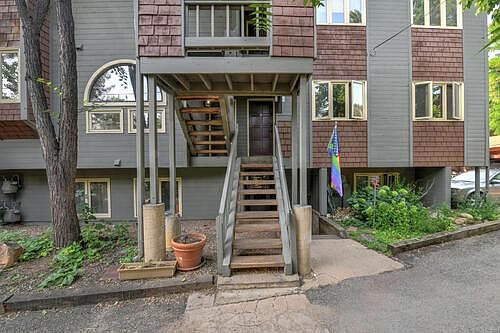 Exterior entrance to condo (1/2 flight of stairs up). End unit!