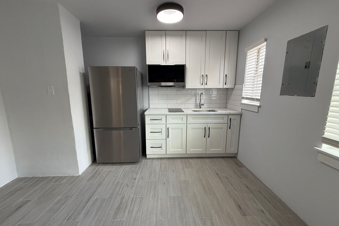 1 bedroom without kitchen island.