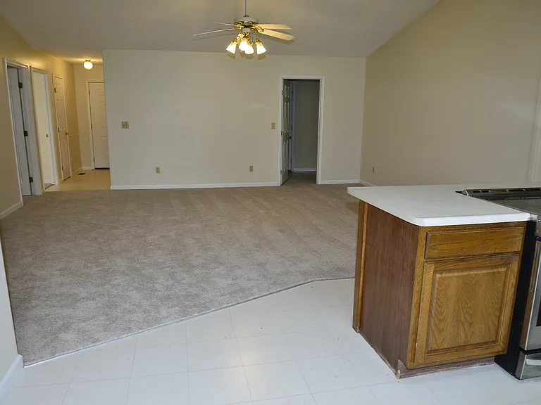 Open Living Area; Right Door is Entrance to Laundry Room