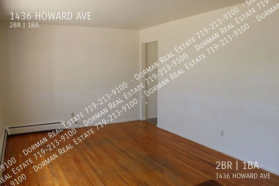 Charming 2-Bedroom Duplex with Hardwood Floors & Private Fenced Backyard — Photo 4