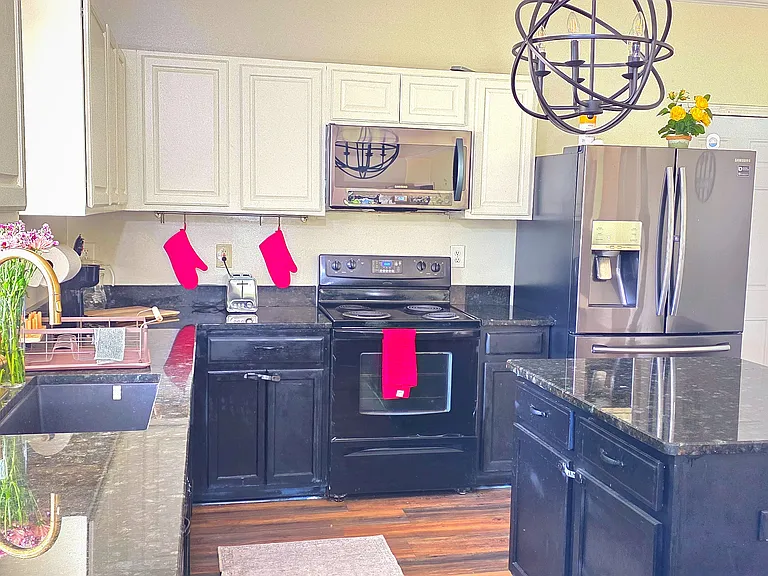 Shared space - Fully loaded and upgraded kitchen with microwave oven, sandwich maker, toaster, coffee maker, huge countertops and stainless steel appliances