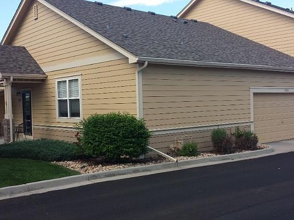 Two car attached garage with minimal stairs entering kitchen