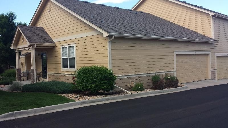 Two car attached garage with minimal stairs entering kitchen