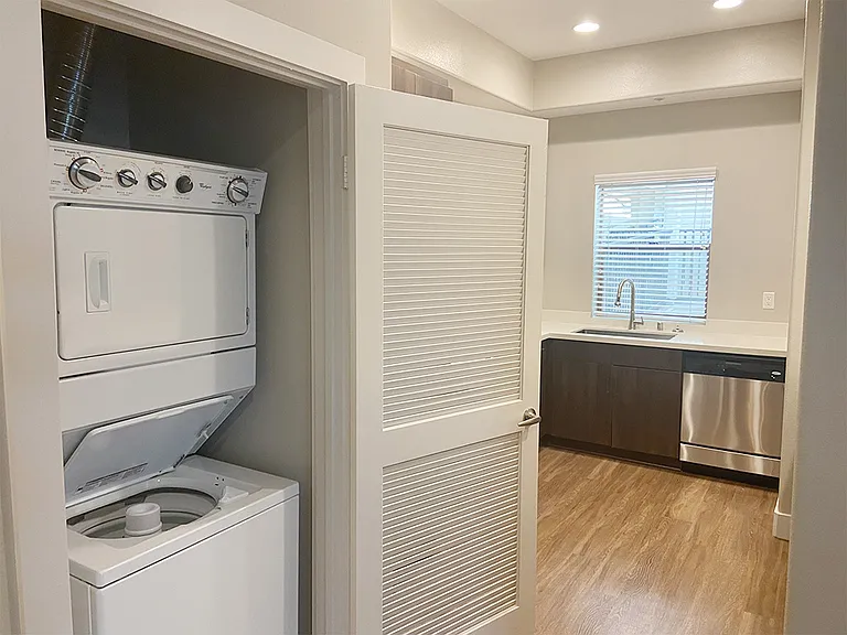 Open floorplan leads to kitchen