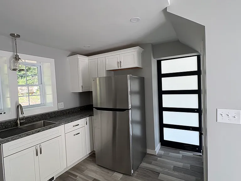 Barn-door pass thru to Living area