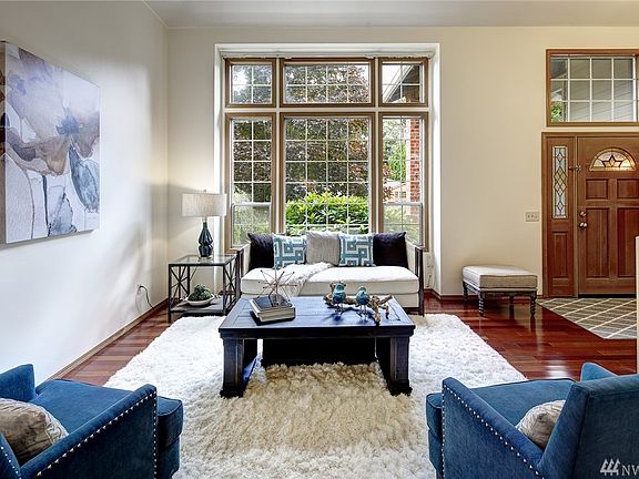 Feel refreshed as you step through your front door and are greeted with an open and airy living room with vaulted ceilings.  