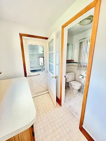 mudroom to garage, shower bath