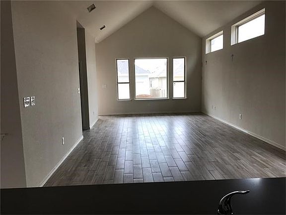 Looking from kitchen island thru breakfast and family room