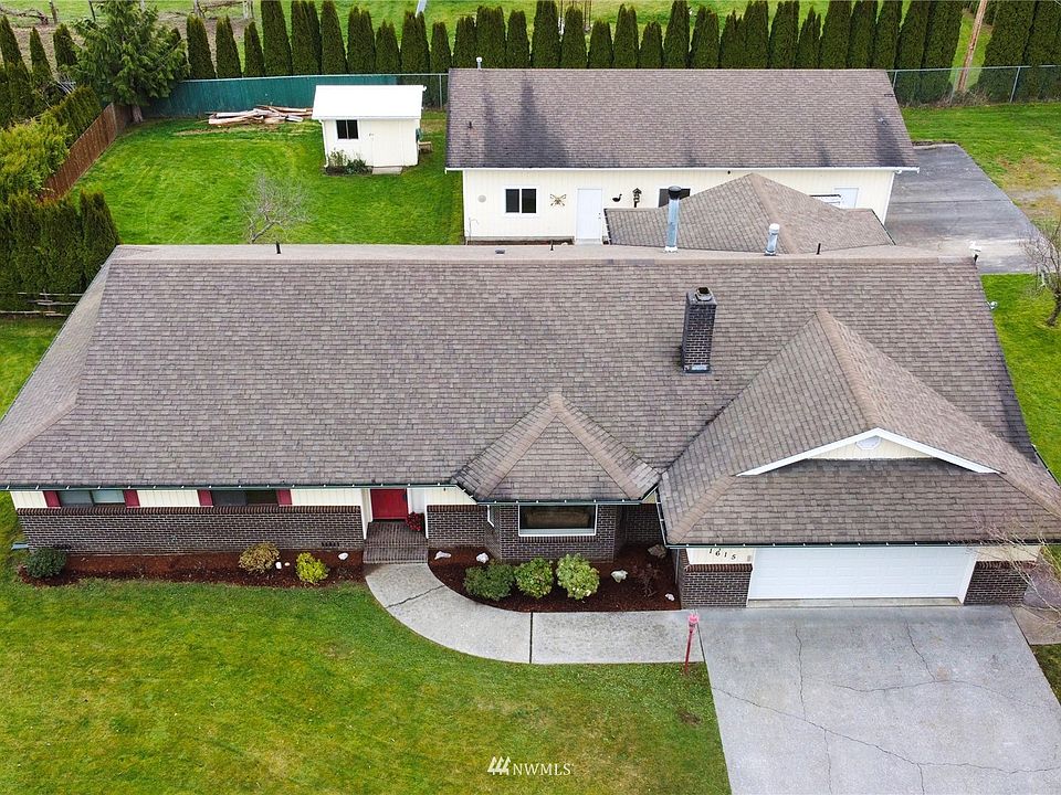 This great home and shop are situated on a large .36 acre corner lot at the edge of city limits. On PUD water and City sewer with great curb appeal! Covered parking for up to 6 cars!