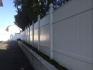 New fence along driveway