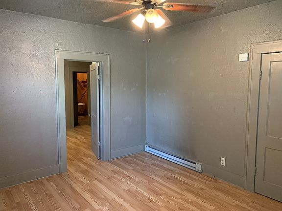 Living Room w/walk-in closet to Rt. w/door to bed room