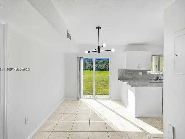 3398 NE 9th Dr #104 — Photo 6