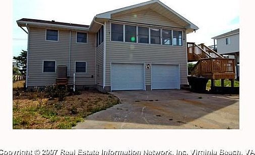 GARAGE WITH CIRCULAR DRIVE FROM REAR STREET