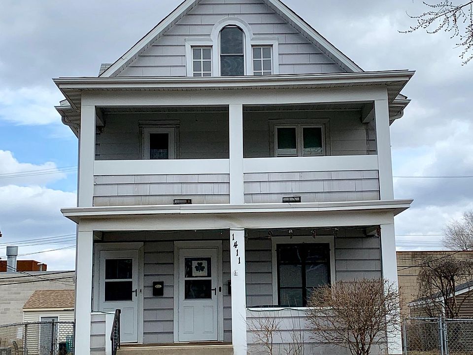 Front of house. Available unit is upstairs. Long-term quiet tenant on first floor