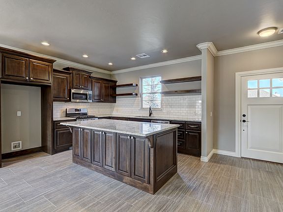 3. Kitchen and front door view