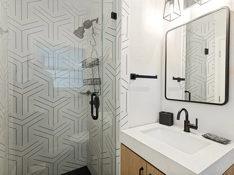 Primary bathroom has been recently remodeled.