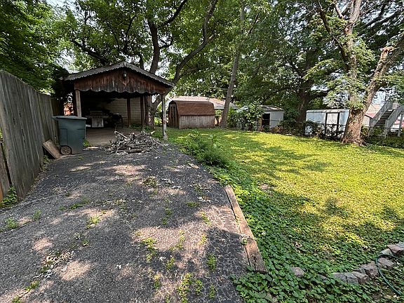 Photo of shared patio space and back yard