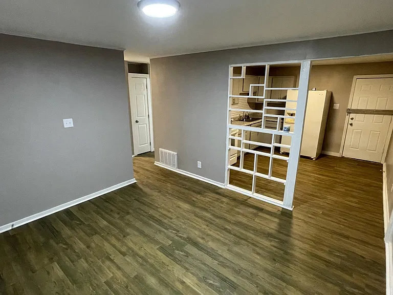 Living room, looking into kitchen