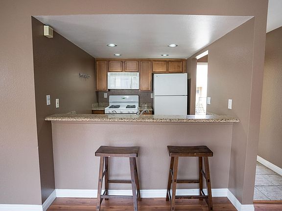 Barstool counter for convenient breakfast nook eating.