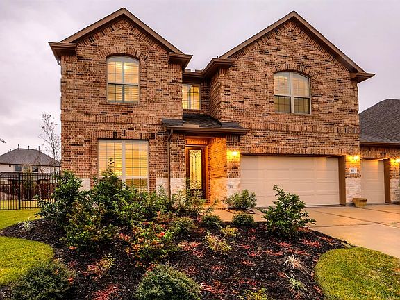 Brick & stone exterior gives the home great curb appeal! 3232 sq. feet of living space and three car garage. Walking distance to schools, parks, pools, shopping and movie theater coming soon!