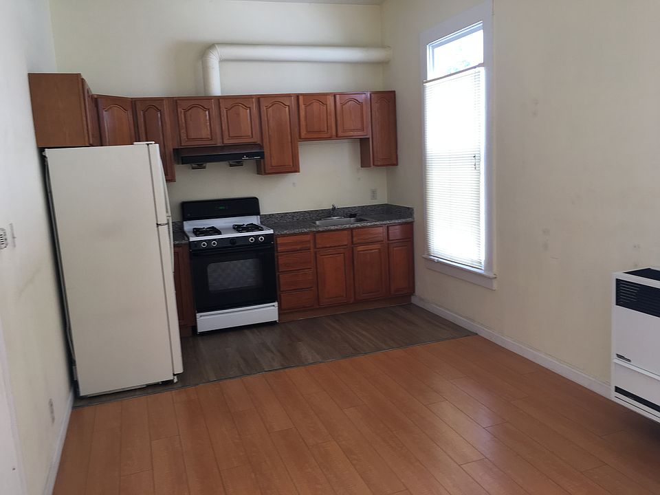 Kitchen with working stove and oven