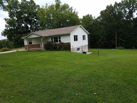 side of house w/ walkout basement door