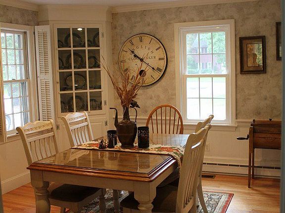 Beautiful dining room with built in and hardwood floors! 
