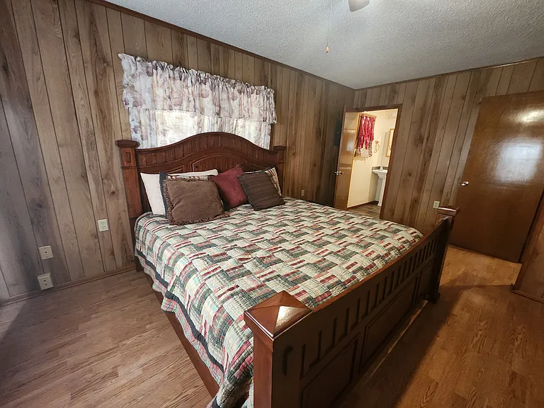 Bedroom #1 with king bed and ensuite bathroom.