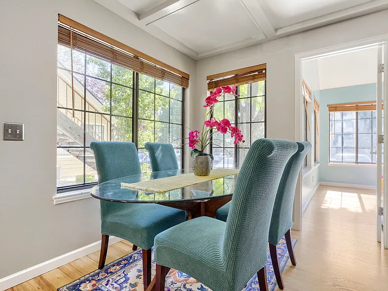 Dining Room _ An elegant dining space with beautiful architectural details, hardwood floors, and a layout suited for casual meals or memorable gatherings.
