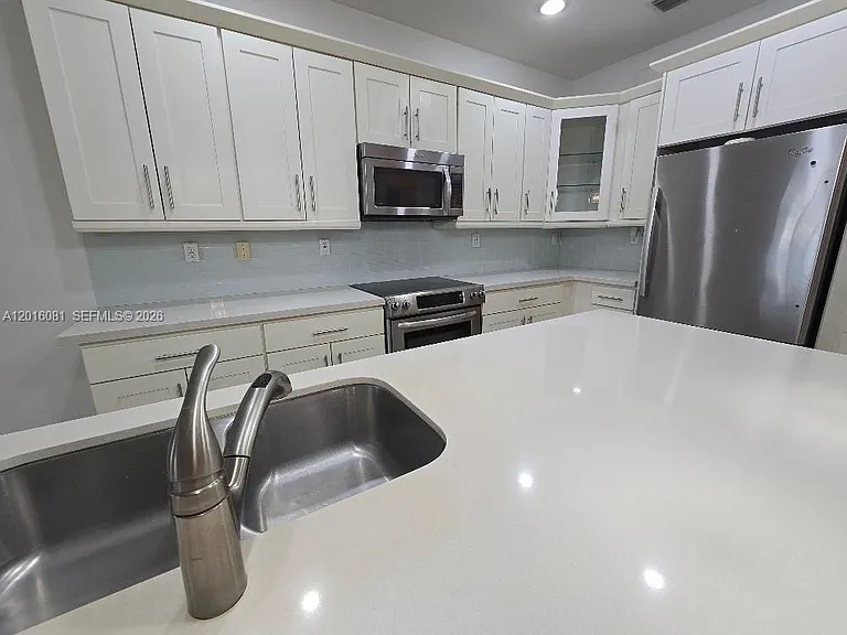 5810 NW 104th Path #5810 — Photo 15