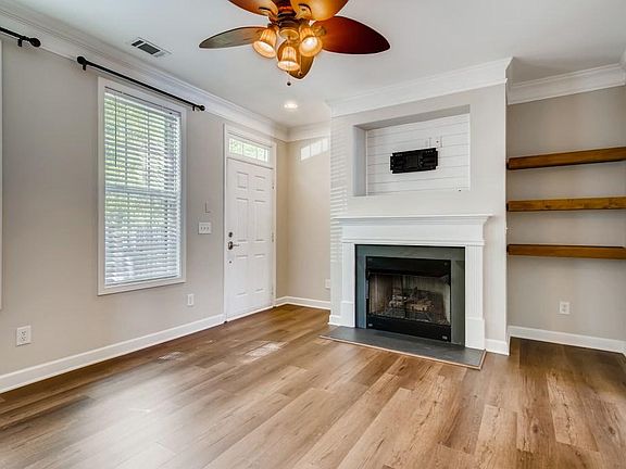 Gas Fireplace, newer Luxury Vinyl Plank Flooring throughout.
