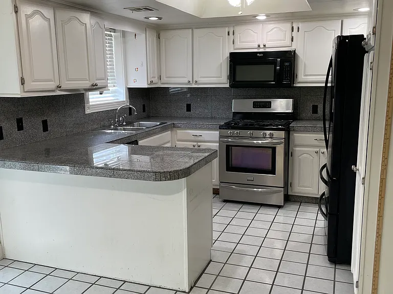 7501 S Trenton Pl — Photo 10