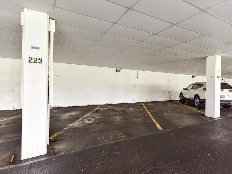 Reserved parking spot under building.