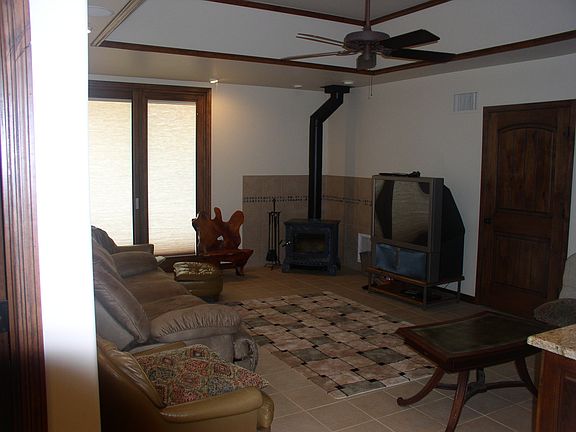 lower level (basement) with wood burning stoveing stove