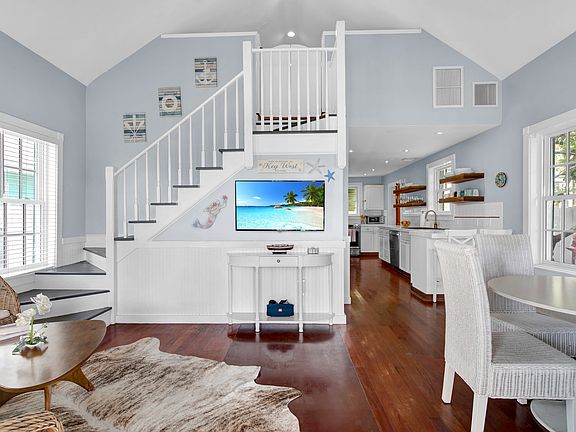 Open Concept with TV that extends to either the dining area or the living room