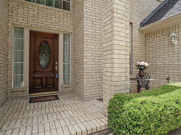 A beautifully manicured lawn guides your guests to your front patio, with a cream colored brick elevation framing your entryway. Enjoy morning sips of coffee, tranquil sights and sounds, in your cozy dedicated seating area to the right.