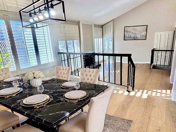 Dining room right off of the kitchen, opening up to the living room.