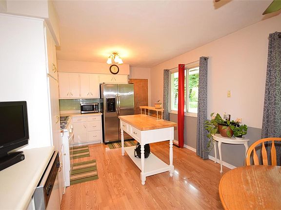 CHECK OUT THE BEAUTIFUL WINDOWS OVERLOOKING THE REAR YARD