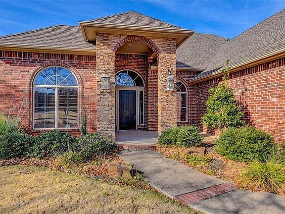 Beautiful entrance with plenty of space on porch for your choice of decor
