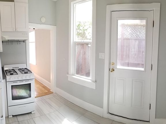 kitchen panorama looking onto patio
