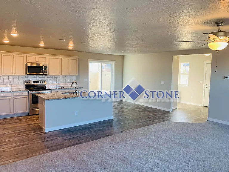 7610 S Sea Breeze Way — Photo 4