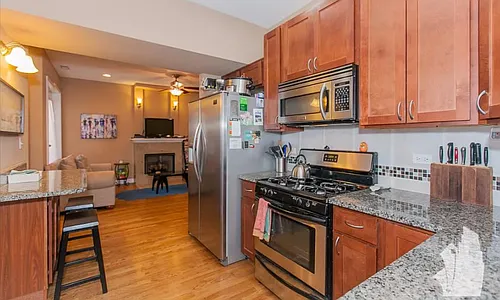 Building Photo - 1009 N Oakley Blvd #2E