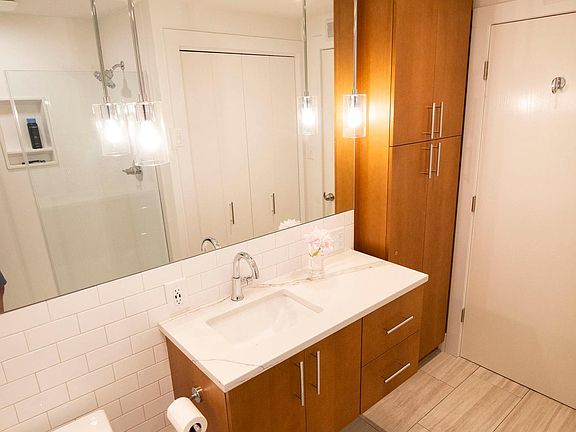 Custom bathroom remodel w/ quartz vanity & walk-in shower