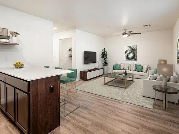 Furnished apartment living area shown — representative home at Deer Valley 24.