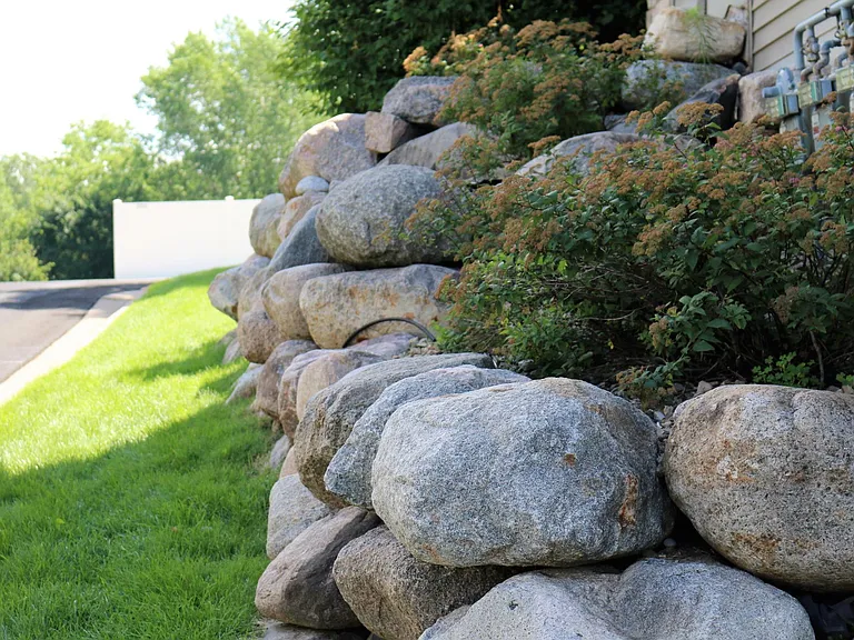 Beautiful landscaping, mowing and plowing provided