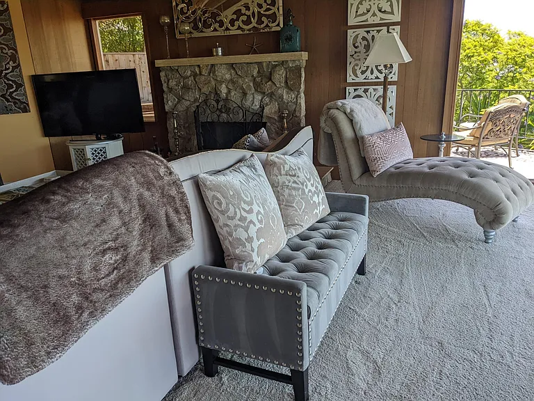 The seating arrangement is an ideal setting for morning coffee, evening cocktails, or unforgettable sunsets.
